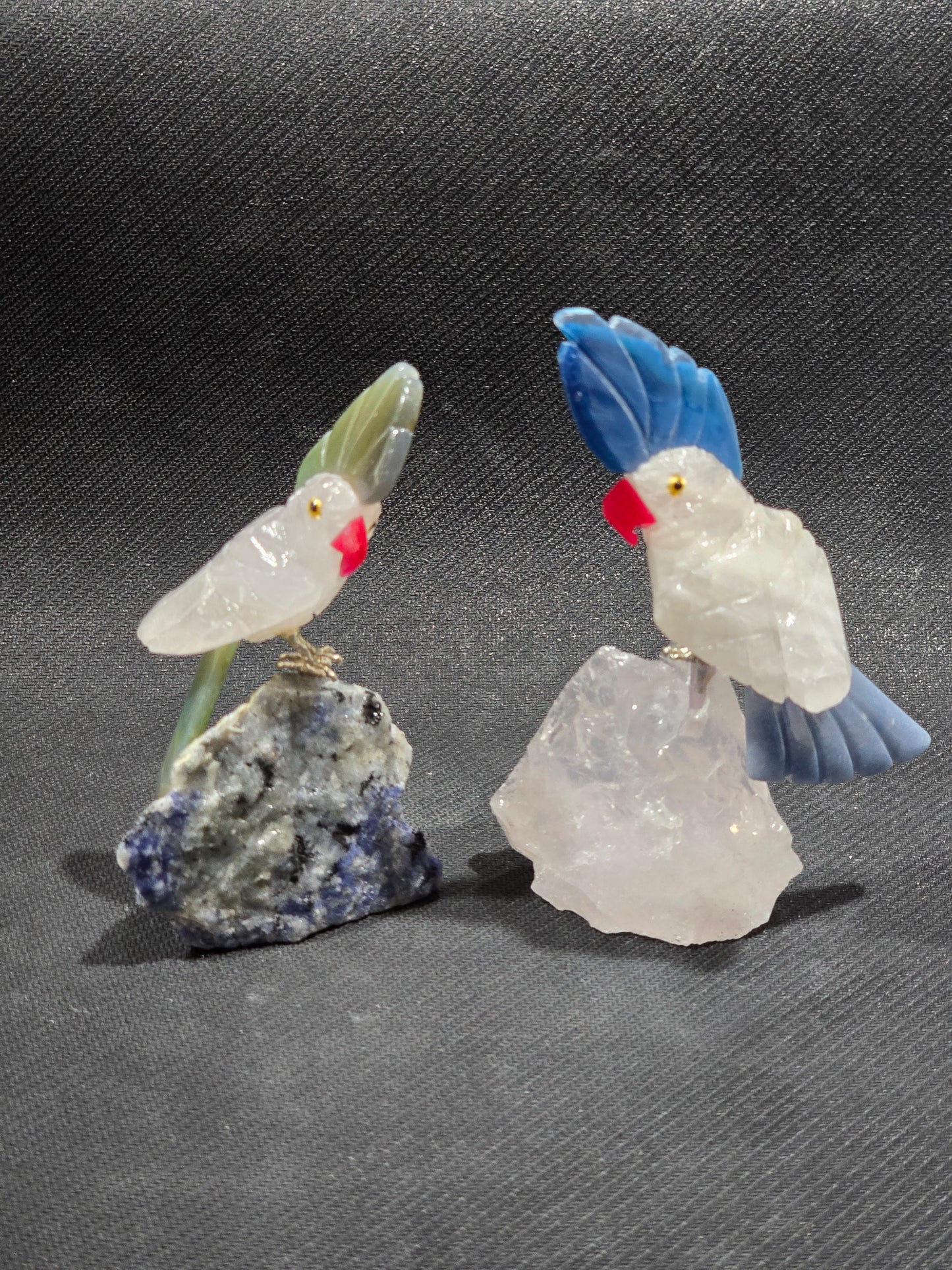 Hand Carved Rose Quartz Parrots on raw stones