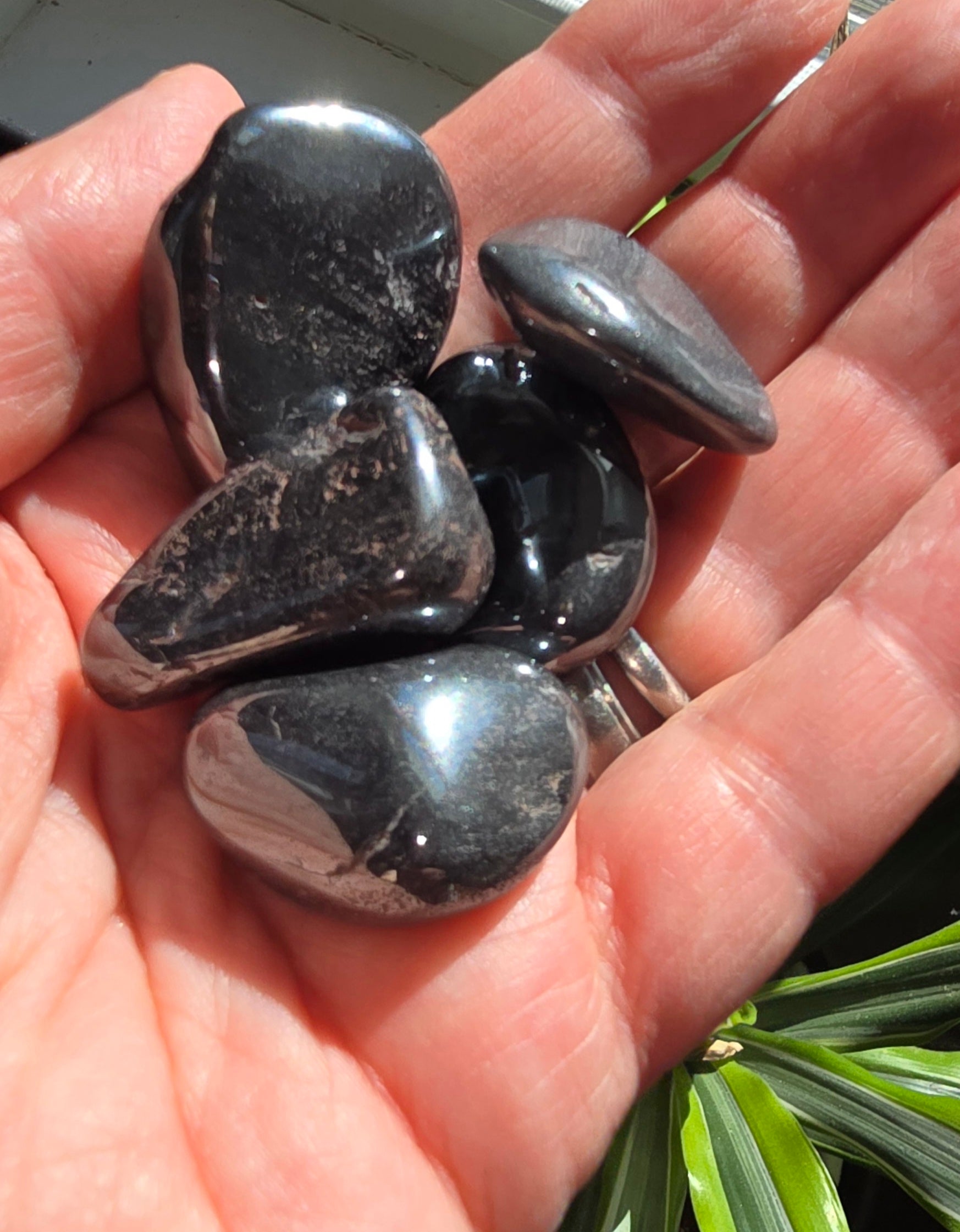 Hematite tumble stone with metallic gray polished smooth surface
