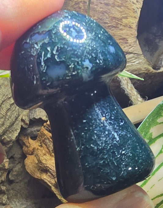 Moss agate mushroom carving with green moss-like inclusions and polished natural stone finish