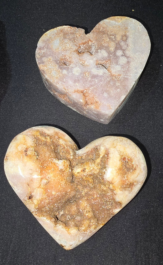 Pink amethyst heart carvings with blush tones polished natural stone